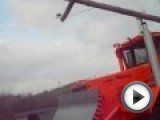 Посмотреть это видео на youtube.com http://www.zavodsm.ru Колёсный петербургский оранжевый универсальный трактор К700 - К707 БАЛТИЕЦ. Лучшие сельскохозяйственные тракторы